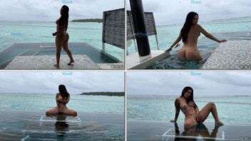 Karol Rosado, atraente colombiana, aproveita a vista para o mar enquanto se masturba na piscina
