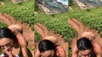 Casal mostrando uma vibe mais ousada com a esposa se divertindo enquanto chupa o marido em uma praia de nudismo