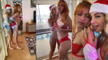 Naty Varga arrasando como mamãe noel sexy em vídeo de pornô lésbico